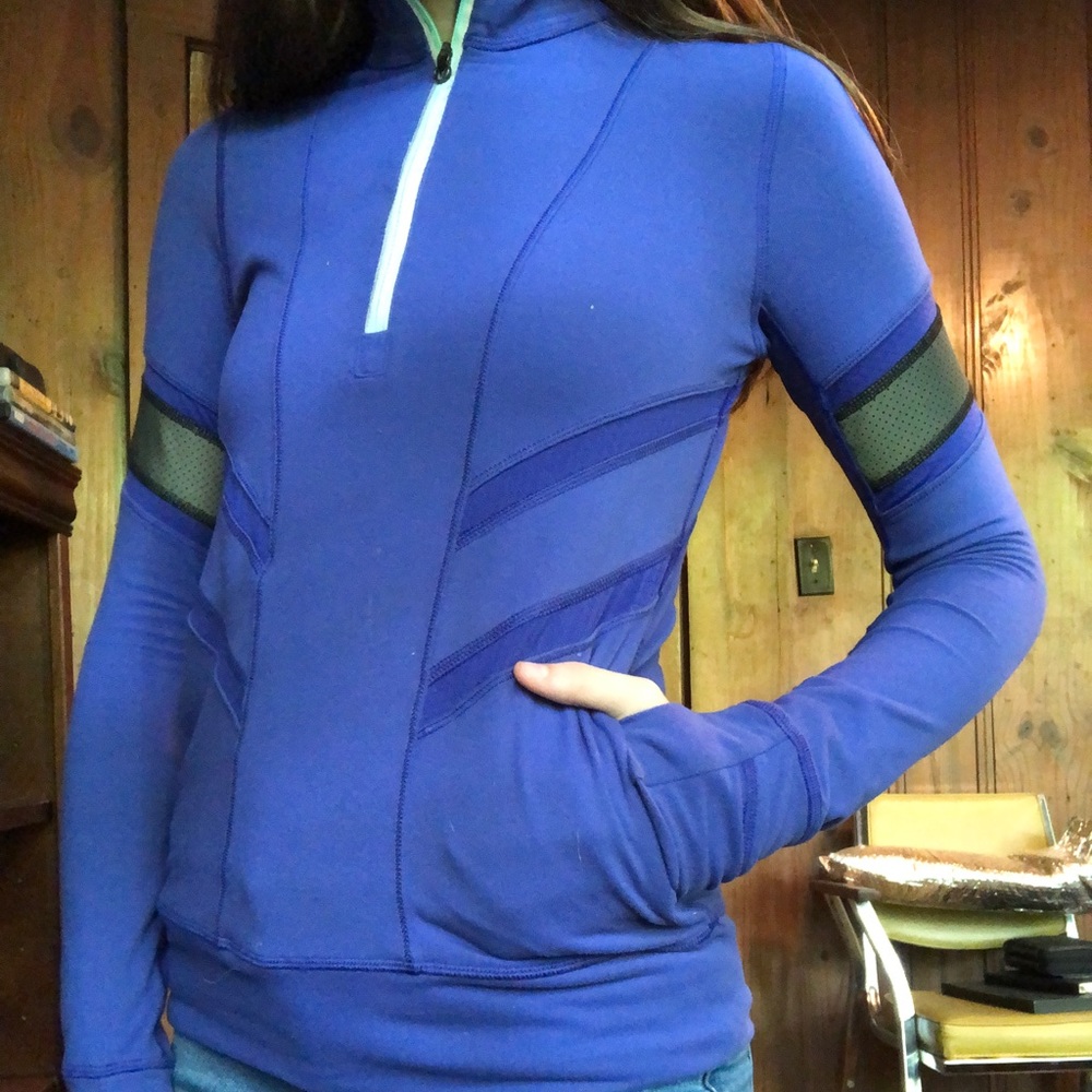 This is an purple iviva athletic pullover